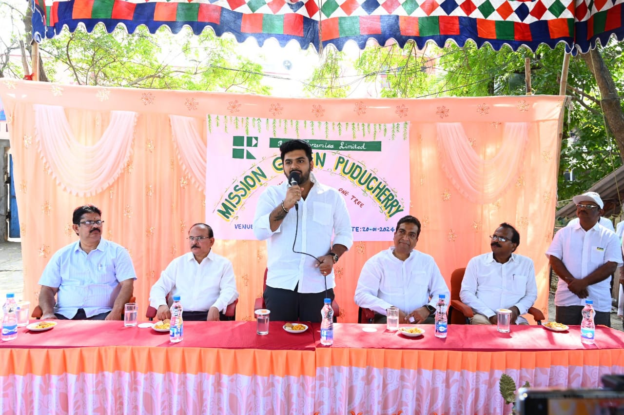 People participating in a tree plantation drive organized by Regency Ceramics